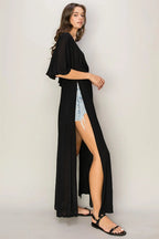 Woman wearing HYFVE Tie Back Maxi Split Cover Up Dress with plunging neckline and side slit maxi skirt
