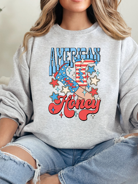 American Honey Graphic Tee printed on premium Comfort Colors 100% cotton featuring an exclusive Willow Boutique western-inspired design, perfect for country concerts, Nashville trips, rodeos, and everyday country style. Crewneck in Grey