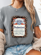 King of Beers Graphic Tee made from soft 100% cotton featuring a vintage-inspired beer graphic, perfect for tailgates, BBQs, brewery visits, country concerts, and casual everyday style. Color Grey