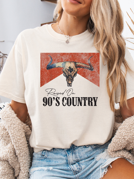 Raised On 90's Country Graphic Tee printed on premium Comfort Colors cotton, featuring an exclusive Willow Boutique design perfect for country concerts, rodeos, and everyday western-inspired style.