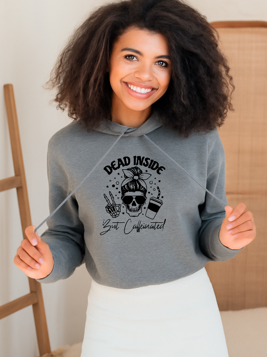 Dead Inside But Caffeinated graphic available as a tee, crewneck, or sweatshirt featuring a fun coffee-inspired design on soft cotton-blend fabric, perfect for Halloween, spooky season, and everyday fall outfits. Cropped Hoodie in Grey