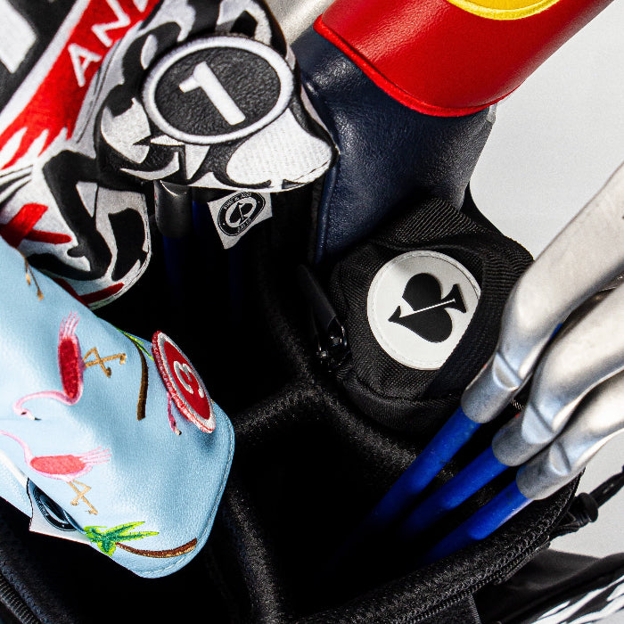 Black Pins & Aces insulated golf beer sleeve designed to hold up to seven cans and slide inside most standard golf bags.