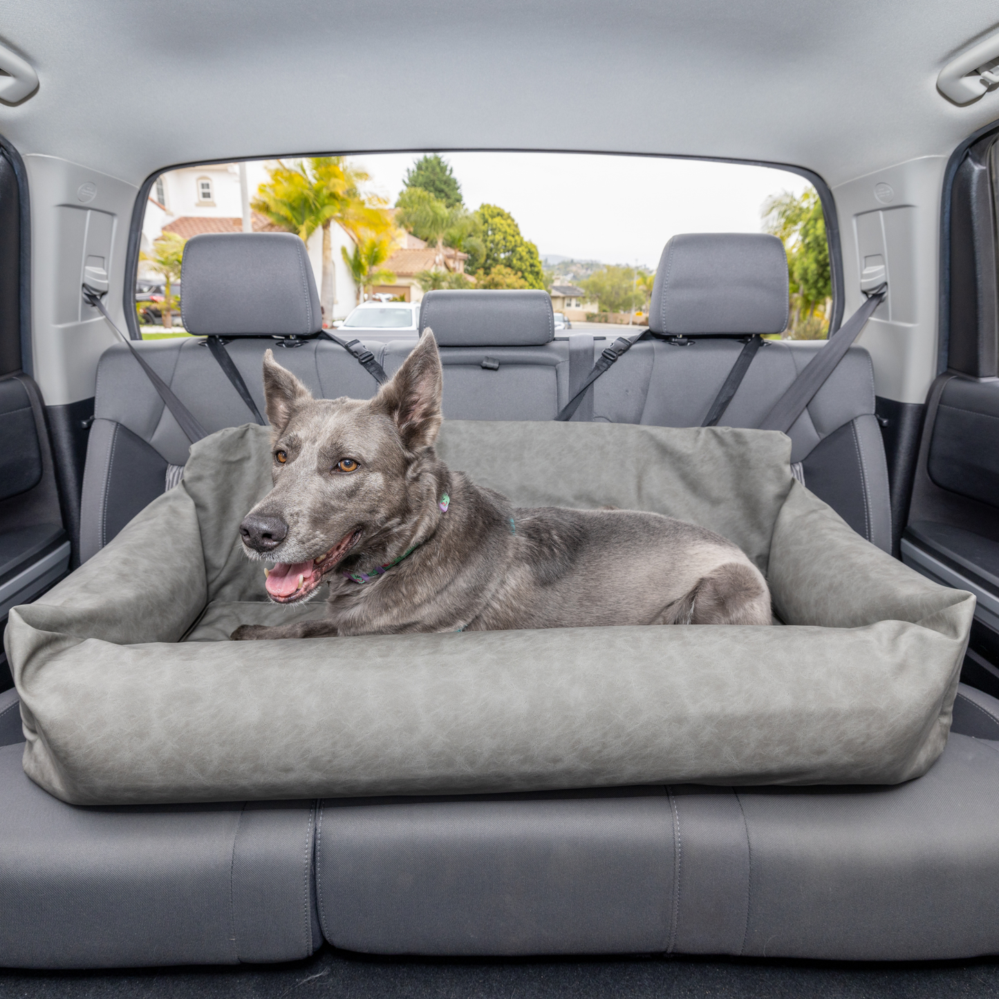 PupProtector™ Faux Leather Dog Car Bed – Memory Foam Booster Seat with Safety Straps, Waterproof Liner & Removable Cover