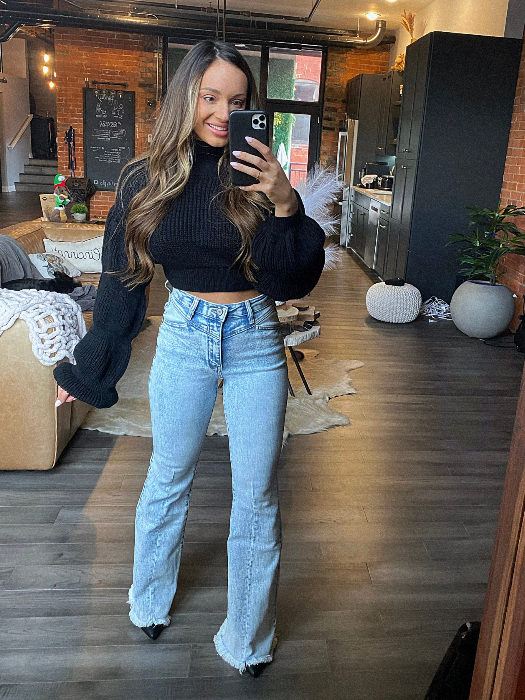 Keep Up Flare Acid Wash Jeans featuring Willow Boutique's exclusive V-Cross waistband, high-rise fit, mega stretch denim, frayed hem, and dramatic flare leg for a flattering boutique look.