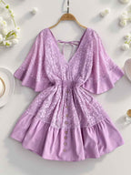 Hope Ruffle Hem Lace Mini Dress featuring delicate lace detailing, a flowy silhouette, feminine ruffle hem, and adjustable tie-back design, perfect for weddings, bridal showers, vacations, and spring or summer occasions. Color Lavender