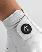 Pins & Aces Premium Tour Ghost White unisex golf glove made from 100% premium AAA Cabretta leather with moisture-wicking wrist lining and men’s standard sizing.