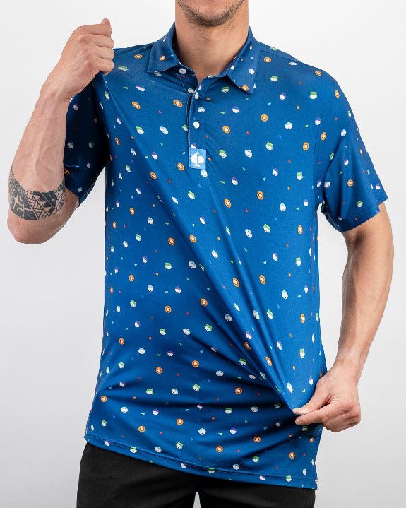 Men’s South Park Classic golf polo by Pins & Aces featuring a blue base with a colorful all-over South Park-themed print, short sleeves, and athletic performance fit.