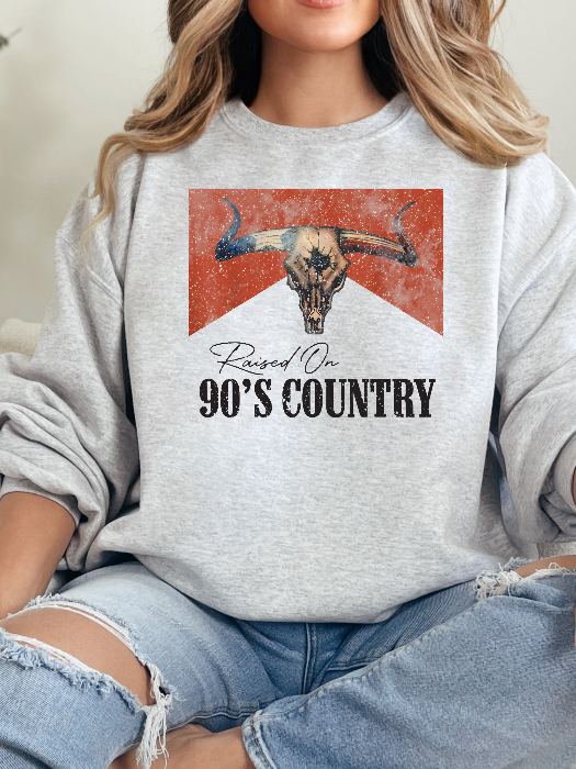 Raised On 90's Country Graphic Tee printed on premium Comfort Colors cotton, featuring an exclusive Willow Boutique design perfect for country concerts, rodeos, and everyday western-inspired style. Crewneck in Grey