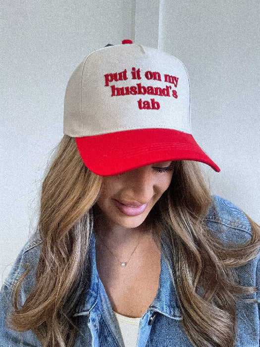 Put it on my husband's tab trucker hat in red and khaki