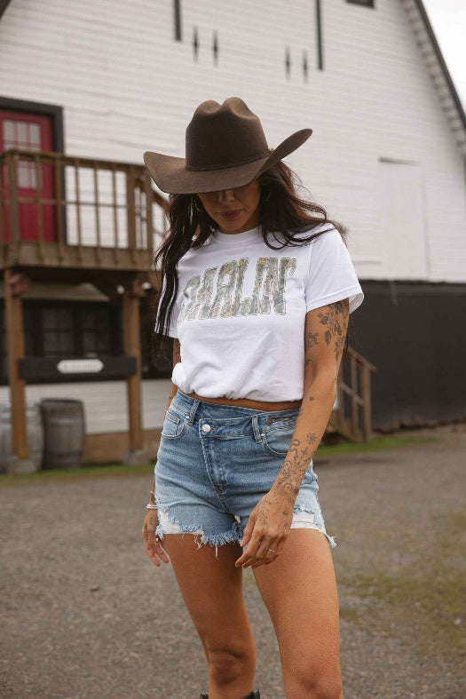 Lindsey Asymmetrical Distressed Shorts Medium Wash