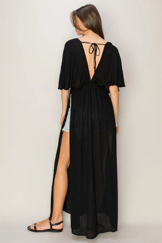 Woman wearing HYFVE Tie Back Maxi Split Cover Up Dress with plunging neckline and side slit maxi skirt