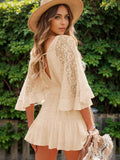 Hope Ruffle Hem Lace Mini Dress featuring delicate lace detailing, a flowy silhouette, feminine ruffle hem, and adjustable tie-back design, perfect for weddings, bridal showers, vacations, and spring or summer occasions. Color Cream