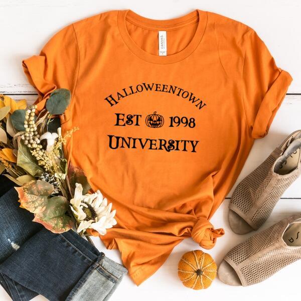 Halloweentown University Halloween T-Shirt featuring a collegiate-style spooky season graphic on a cozy crewneck in Orange