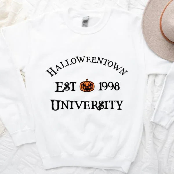 Halloweentown University Halloween sweatshirt featuring a collegiate-style spooky season graphic on a cozy crewneck in White