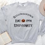Halloweentown University Halloween sweatshirt featuring a collegiate-style spooky season graphic on a cozy crewneck in Grey