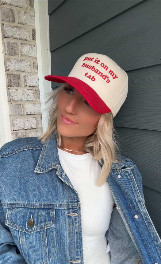Put it on my husband's tab trucker hat in red and khaki