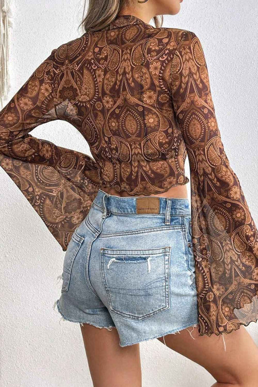 Saylor Mock Neck Flared Sleeve Top featuring sheer mesh long sleeves, an elegant mock neckline, flattering stretch fit, and dramatic flared sleeve cuffs for a chic boutique look.