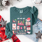 Comfort Colors Ho Ho Ho ’Tis The Season long sleeve Christmas shirt featuring a festive holiday graphic on a relaxed garment-dyed 100% cotton tee in Blue Spruce