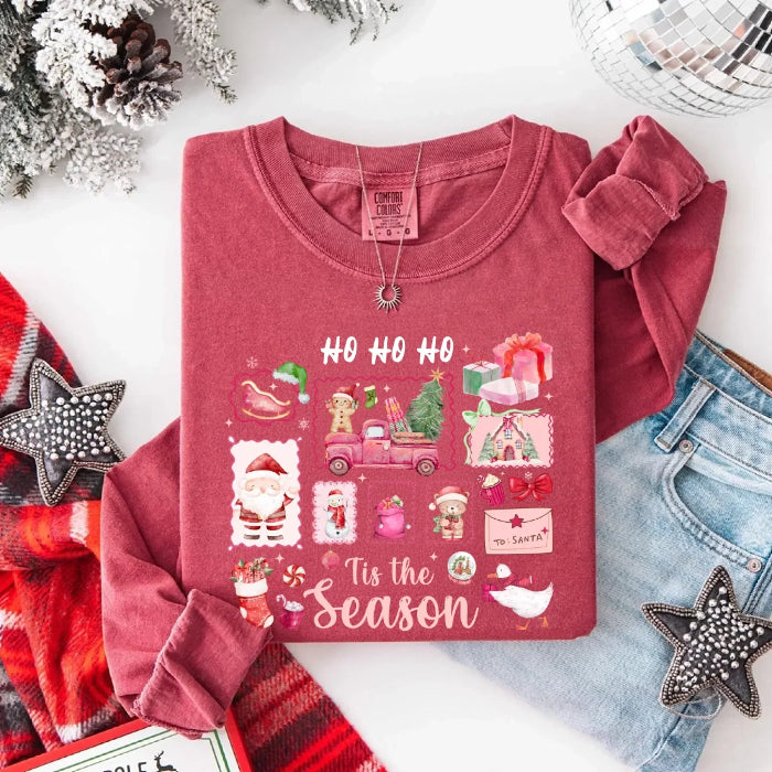 Comfort Colors Ho Ho Ho ’Tis The Season long sleeve Christmas shirt featuring a festive holiday graphic on a relaxed garment-dyed 100% cotton tee in Crimson