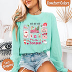 Comfort Colors Ho Ho Ho ’Tis The Season long sleeve Christmas shirt featuring a festive holiday graphic on a relaxed garment-dyed 100% cotton tee in Island Reef