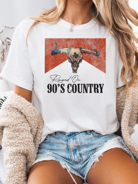 Raised On 90's Country Graphic Tee printed on premium Comfort Colors cotton, featuring an exclusive Willow Boutique design perfect for country concerts, rodeos, and everyday western-inspired style.