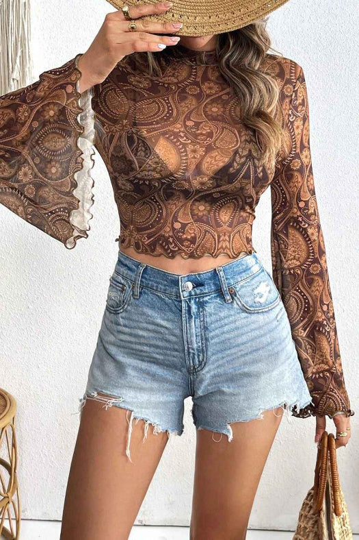 Saylor Mock Neck Flared Sleeve Top featuring sheer mesh long sleeves, an elegant mock neckline, flattering stretch fit, and dramatic flared sleeve cuffs for a chic boutique look.