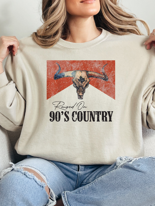 Raised On 90's Country Graphic Tee printed on premium Comfort Colors cotton, featuring an exclusive Willow Boutique design perfect for country concerts, rodeos, and everyday western-inspired style. Crewneck in Ivory