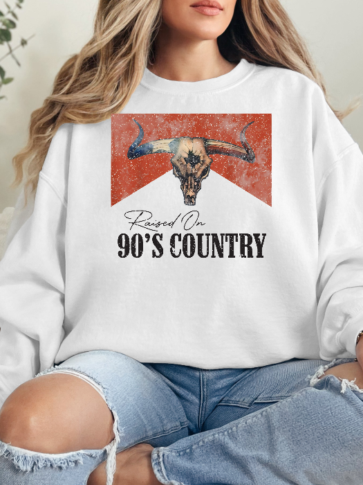 Raised On 90's Country Graphic Tee printed on premium Comfort Colors cotton, featuring an exclusive Willow Boutique design perfect for country concerts, rodeos, and everyday western-inspired style. Crewneck in White