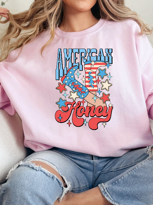 American Honey Graphic Tee printed on premium Comfort Colors 100% cotton featuring an exclusive Willow Boutique western-inspired design, perfect for country concerts, Nashville trips, rodeos, and everyday country style. Crewneck in Light Pink