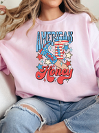 American Honey Graphic Tee printed on premium Comfort Colors 100% cotton featuring an exclusive Willow Boutique western-inspired design, perfect for country concerts, Nashville trips, rodeos, and everyday country style. Crewneck in Light Pink