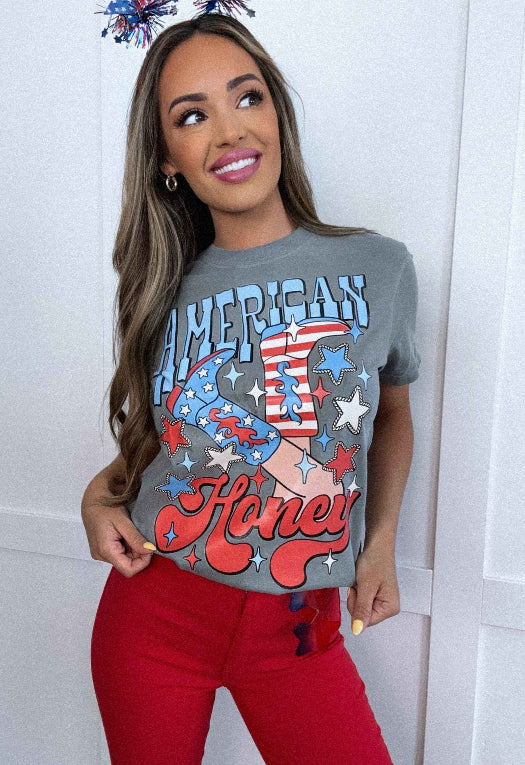 American Honey Graphic Tee printed on premium Comfort Colors 100% cotton featuring an exclusive Willow Boutique western-inspired design, perfect for country concerts, Nashville trips, rodeos, and everyday country style. Tshirt in Grey
