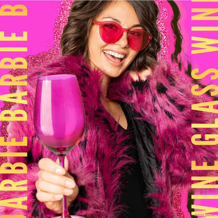 Set of two Barbie™ x Dragon Glassware® 17.5 oz stemmed wine glasses in pink and magenta with signature Barbie™ logos on the bases and coordinating pink gift box.