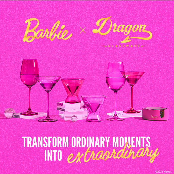 Set of two Barbie™ x Dragon Glassware® 17.5 oz stemmed wine glasses in pink and magenta with signature Barbie™ logos on the bases and coordinating pink gift box.