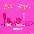 Two Barbie™ x Dragon Glassware® 16-ounce stemless wine glasses in pink and magenta with sculptural curved sides, displayed in front of a bright pink Barbie™ gift box.