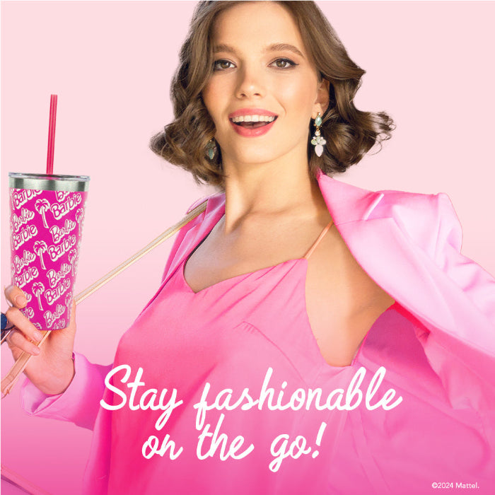 Barbie™ x Dragon Glassware® 16-ounce insulated stainless steel travel tumbler with removable lid and two reusable straws, including one pink and one clear straw.