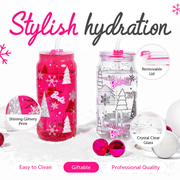 Set of two officially licensed Barbie™ Christmas 20 oz drinking glasses by Dragon Glassware in pink and clear designs with holiday trees, snowflakes, lids, glass straws, and gift box.