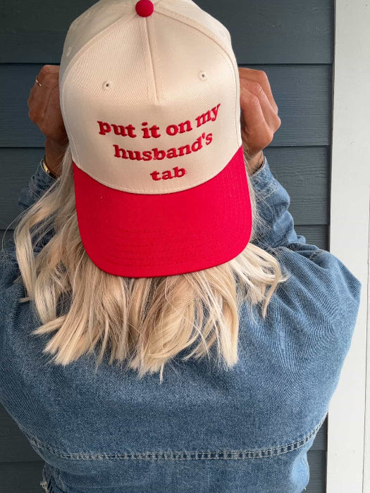 Put it on my husband's tab trucker hat in red and khaki