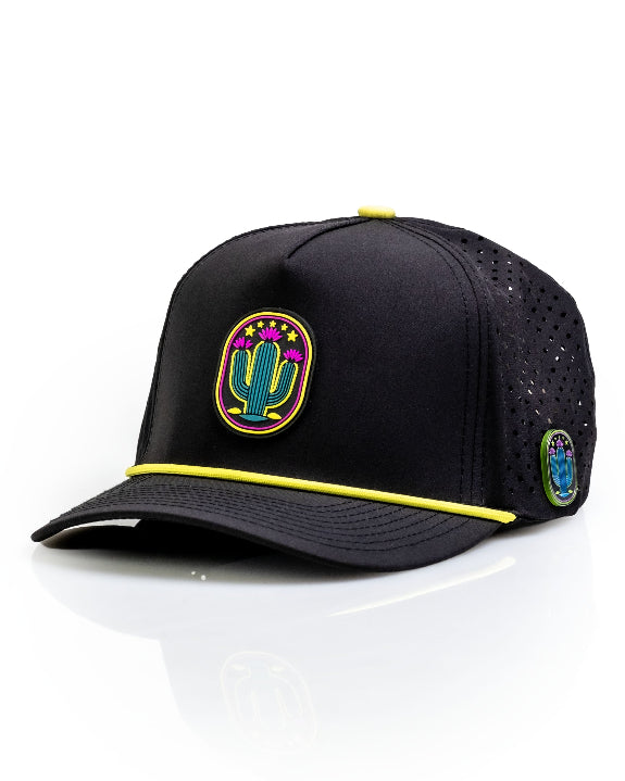 Cactus Black perforated rope golf hat by Pins & Aces featuring a cactus-inspired design, adjustable snapback, built-in magnetic ball marker holder, and matching golf ball marker.