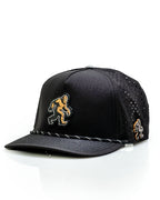 Pins & Aces Sasquatch Black perforated golf rope hat with adjustable snapback, magnetic ball marker holder, and matching golf ball marker.