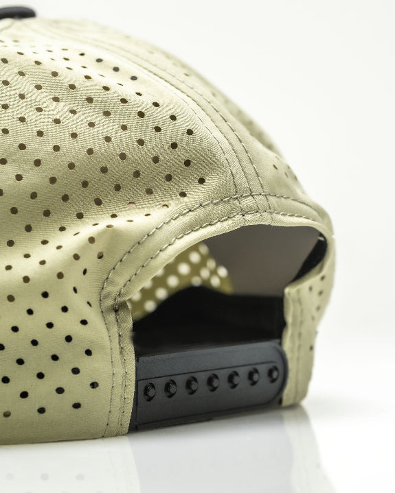 Gator Olive perforated rope golf hat by Pins & Aces featuring an olive green design, breathable perforated panels, adjustable snapback, and built-in magnetic golf ball marker holder.
