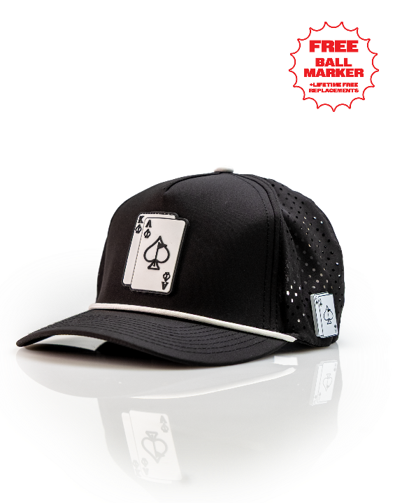 Ace/King Black perforated rope golf hat by Pins & Aces featuring a black poker-inspired design, braided rope accent, adjustable snapback, and built-in magnetic ball marker holder.