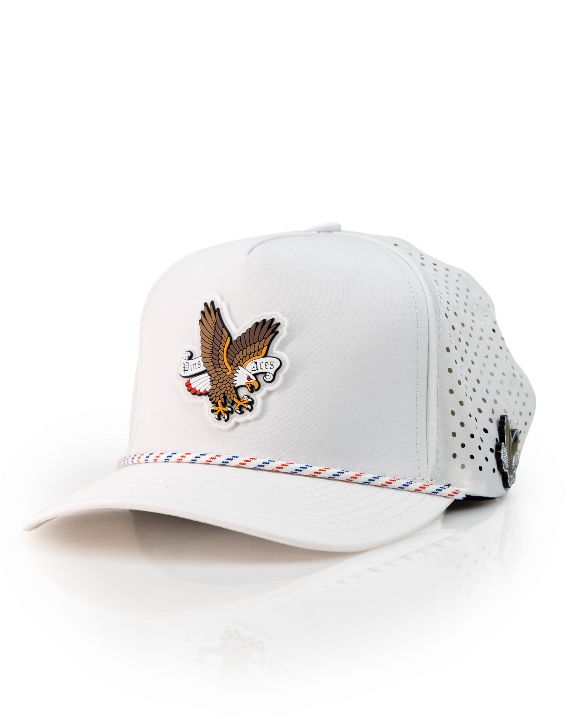 Freedom Eagle White perforated rope golf hat by Pins & Aces featuring a patriotic eagle design, adjustable snapback, magnetic ball marker holder, and matching golf ball marker.