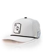 Ace/King White perforated rope golf hat by Pins & Aces with an adjustable snapback, built-in magnetic ball marker holder, and matching golf ball marker.