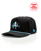Kraken Black perforated rope golf hat by Pins & Aces featuring an all-black design, braided rope accent, breathable perforated panels, adjustable snapback, and built-in magnetic golf ball marker holder.