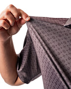 Pins & Aces x Blazy Susan men’s performance golf polo featuring a lightweight stretch design, short sleeves, and athletic golf fit.