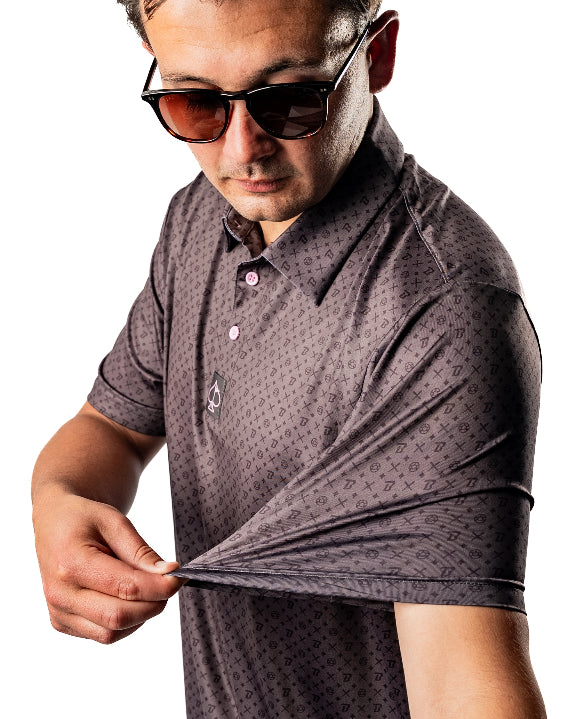 Pins & Aces x Blazy Susan men’s performance golf polo featuring a lightweight stretch design, short sleeves, and athletic golf fit.