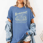 Booktrovert Comfort Colors T-shirt featuring a playful book lover graphic on a relaxed garment-dyed 100% cotton tee for readers and bookworms in color Blue Jean