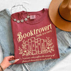 Booktrovert Comfort Colors T-shirt featuring a playful book lover graphic on a relaxed garment-dyed 100% cotton tee for readers and bookworms in color Crimson
