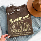 Booktrovert Comfort Colors T-shirt featuring a playful book lover graphic on a relaxed garment-dyed 100% cotton tee for readers and bookworms in color Espresso