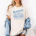 Booktrovert Comfort Colors T-shirt featuring a playful book lover graphic on a relaxed garment-dyed 100% cotton tee for readers and bookworms in color Ivory